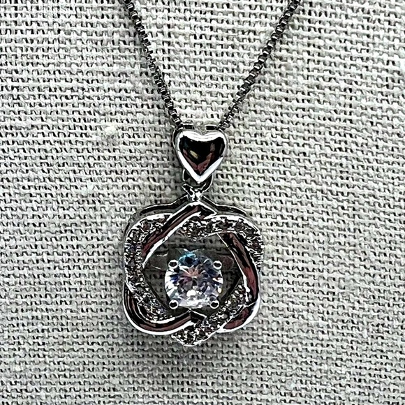 Sterling Silver Heart & Knot Pendant Necklace With Sparkling Cubic Zirconia - Picture 2 of 10